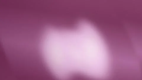A glowing soft focus light heart pulses in a seamless loop Stock Footage 341665541