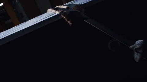 Glowing Sparks at Sharp Metal Edge in Dark Workshop, Industrial Mood, Close Up Stock Footage 340329633