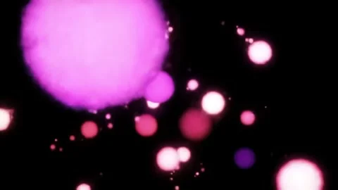 Glowing Spheres Floating Dynamically on Black Background Stock Footage 313348657
