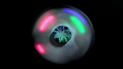 Glowing Spinner Spins On A Black Background Video stock 77665537