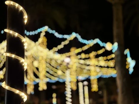 Glowing Spiral String Lights at Night Stock Photos