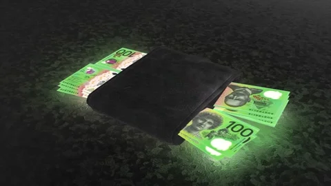 Glowing stack of Australian 100 dollar banknotes inside a black wallet Stock Footage 318899257