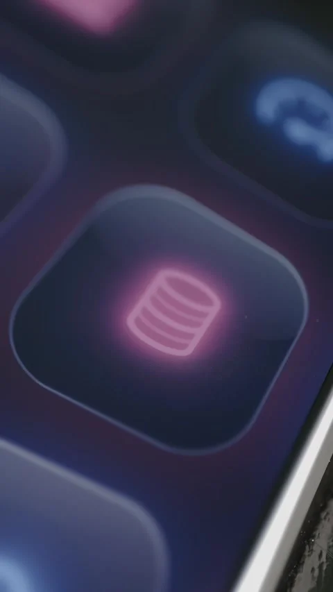 Glowing stacked database symbol appears on a purple smartphone dashboard Stock-Footage 342488435