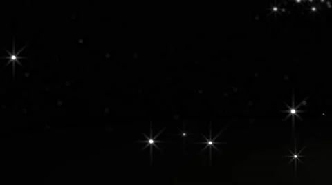 Glowing star particle in random direction with bounce on spotlight ground abs Stock Footage 65215467