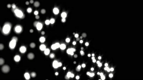 Glowing star particle in random direction with bounce on spotlight ground abs Stock Footage 65307054