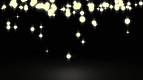 Glowing star particle in random direction with bounce on spotlight ground abs Stock Footage 65307091