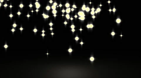 Glowing star particle in random direction with bounce on spotlight ground abs Stock Footage 65307102
