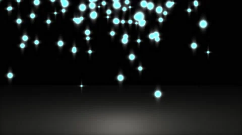 Glowing star particle in random direction with bounce on spotlight ground abs Stock Footage 65307127