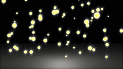 Glowing star particle in random direction with bounce on spotlight ground abs Stock Footage 65307152