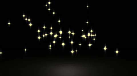 Glowing star particle in random direction with bounce on spotlight ground abs Stock Footage 65495742