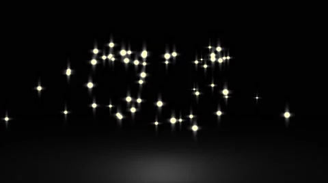 Glowing star particle in random direction with bounce on spotlight ground abs Stock Footage 65767707