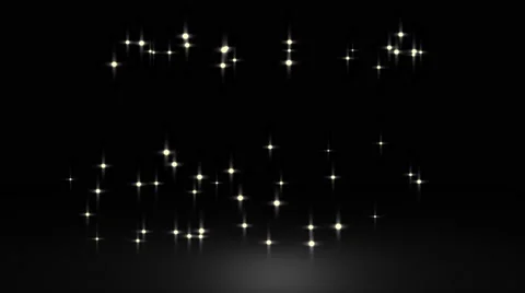 Glowing star particle in random direction with bounce on spotlight ground abs Stock Footage 65767733