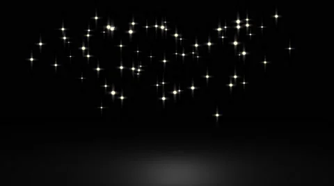 Glowing star particle in random direction with bounce on spotlight ground abs Stock Footage 65767735