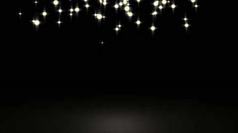 Glowing star particle in random direction with bounce on spotlight ground abs Stock Footage 65937396