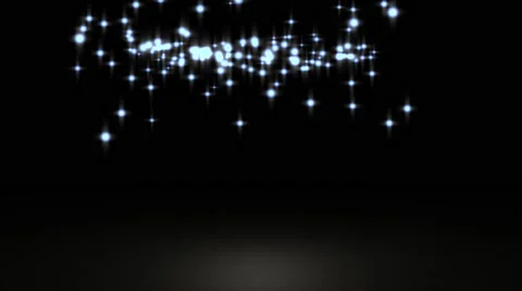 Glowing star particle in random direction with bounce on spotlight ground abs Stock Footage 65937421