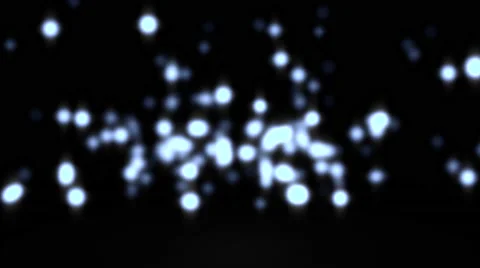 Glowing star particle in random direction with bounce on spotlight ground abs Stock Footage 66058503