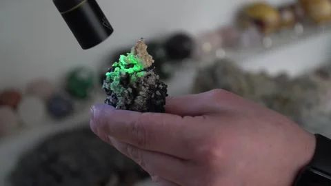Glowing stone. Opal. The stone glows under ultraviolet light. Geology. Stock Footage 266277508