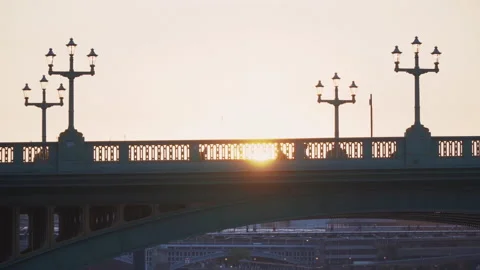 Glowing sunlight in the background people walking commuters London City Stock Footage 146675211
