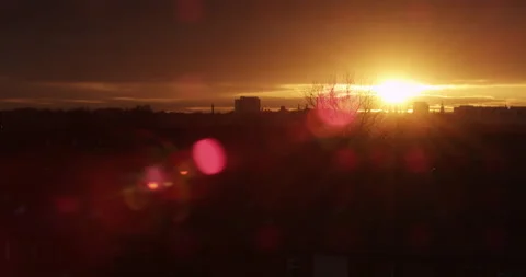 GLOWING SUNSET OVER CITY Stock Footage 141532273