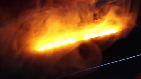 Glowing swirling smoke create an enchanting atmosphere in a dimly lit space Vídeos de archivo 295277853