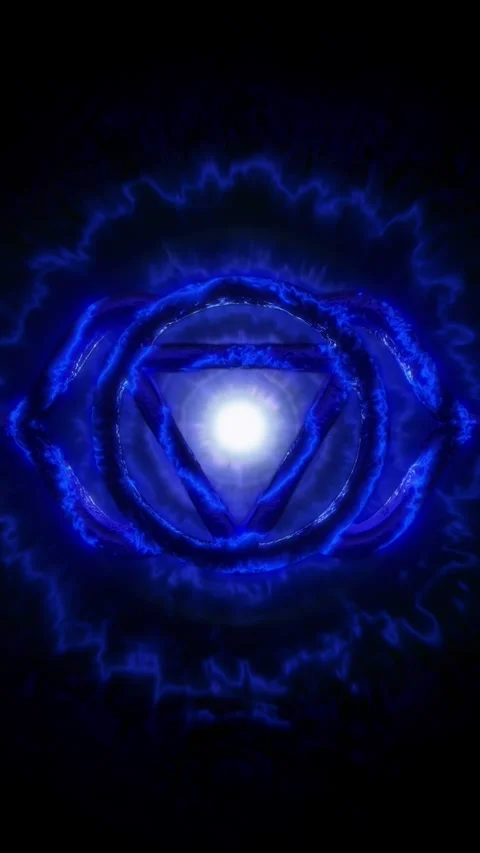 Glowing Third Eye Chakra energy vortex animation, radiant light aura, sacred Stock Footage 319086798