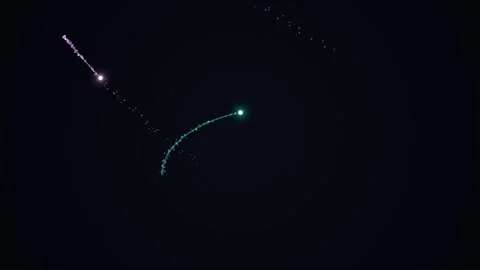 Glowing trails with star-like points in dark space 스톡 동영상 331646348