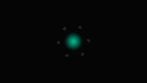 A glowing turquoise sphere centered with orbiting particles in deep space Stock Footage 339615728