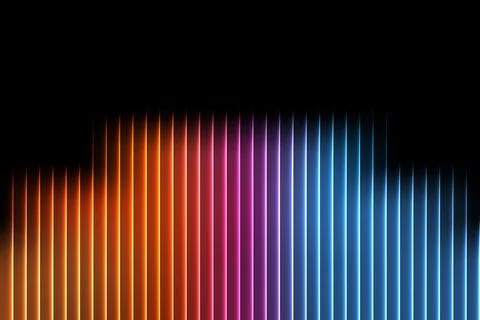 Glowing vertical lines in gradient spectrum from orange to blue on black bac.. Stock Illustration