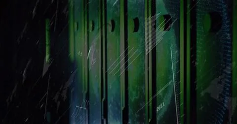 Glowing vertical server racks emitting green light in server room aisle, show Stock Photos