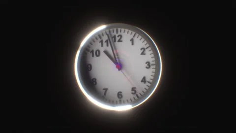 Glowing Wall Clock with White Face and Black Numbers Against Dark Backgroun.. Video stock 314066279