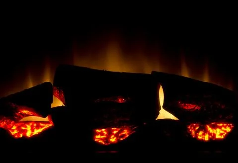 Glowing warm fireplace Stock Photos