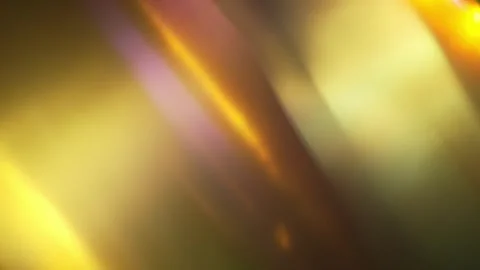 Glowing warm soft prism reflections on a smooth gold and rainbow background with 스톡 동영상 303395570