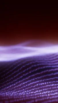 A glowing wavy digital surface made of purple light dots fading into a red at Stock Illustration