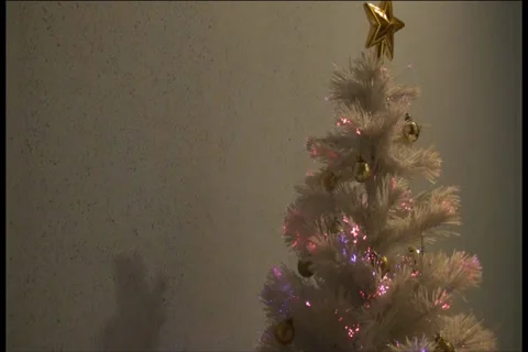 Glowing White Christmas Tree - K - 720x480 - 1 minute loop Stock Footage 33304064