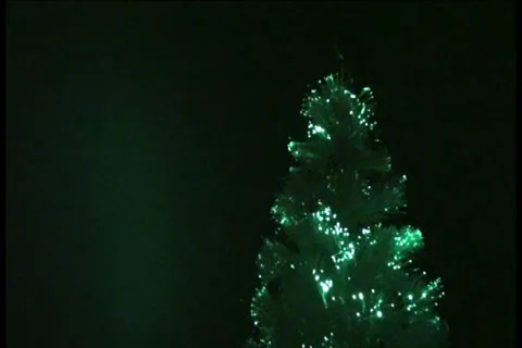 Glowing White Christmas Tree - O - 720x468 - 1 minute loop Stock Footage 33308597