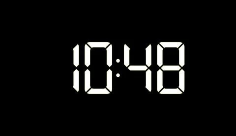 Glowing white digital clock display showing time on black background abstract 库存插图
