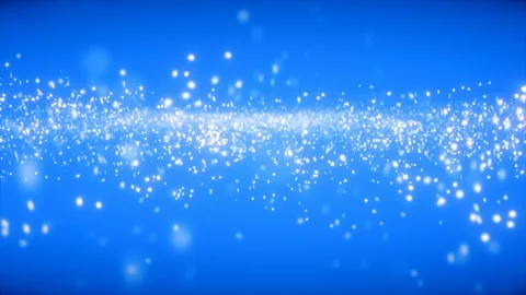 Glowing white dust particles drifting on bright blue background Video stock 342411374