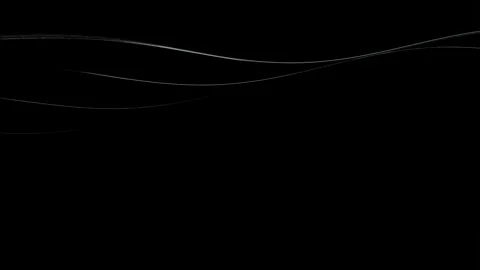 Glowing white energy trails undulating in dark space Video stock 336776055