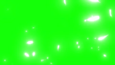 Glowing white feathers floating downward against bright green screen background Vídeos de archivo 344713209