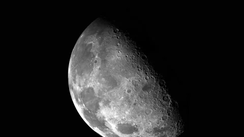 Glowing white moon in the night sky in timelapse. moon time lapse. Video stock 217437825