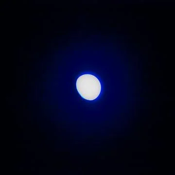 Glowing white orb on dark background Stock Photos