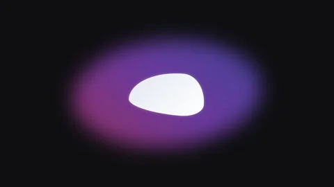 A glowing white organic shape set against a soft purple and blue aura backg.. Stock Footage 339616013