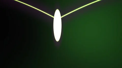 Glowing white oval object on a neon green string against dark background. 動画素材 337514042