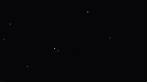 Glowing White Particles Floating on Black Background 스톡 동영상 342830323