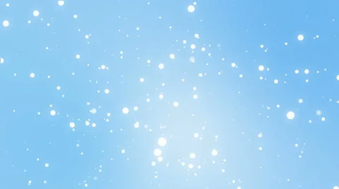 Glowing white snowflakes falling down against a light blue background Stock Footage 68509744