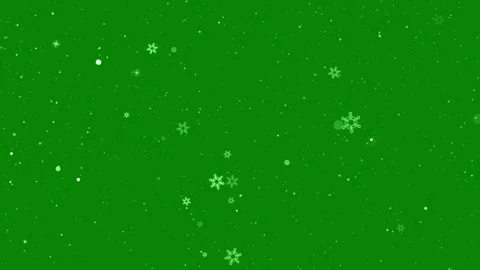 Glowing White Snowflakes Falling on Green Background with Winter Light Effect Stock Footage 323505576