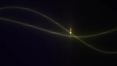 Glowing yellow light trails on dark background. Stock Footage 337514264