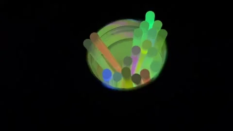 Glowsticks revealed Stock Footage 251682963