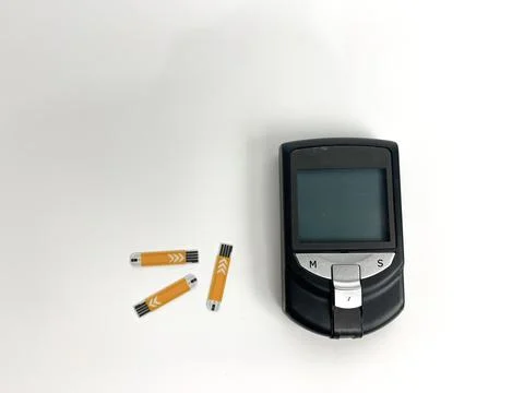 Glucometer for checking blood sugar. Diabetes concept on white background Stock Photos