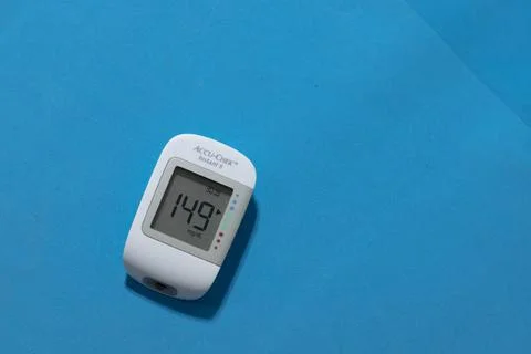 Glucometer showing a bad result in the display, Glucometer isolated Stock Photos